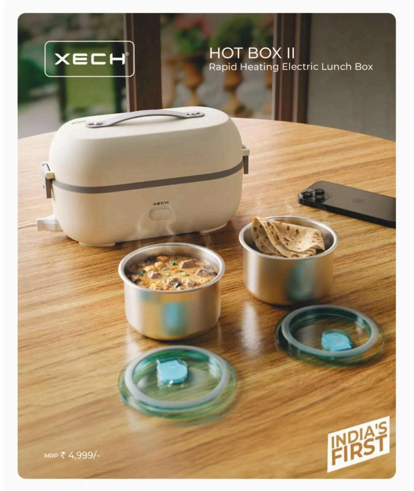 XECH Hot Box II cream electric lunch box on a wooden table with two stainless steel containers of curry and rotis and their sealed lids.