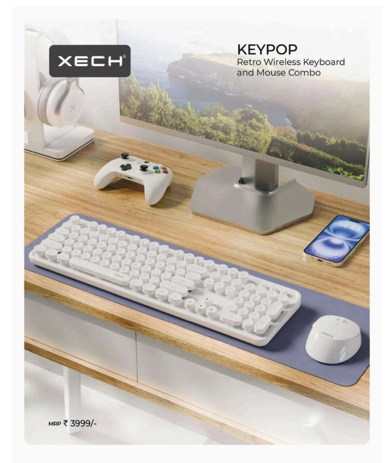 White XECH Keypop retro keyboard and matching round mouse on a purple desk mat, with a monitor, game controller and phone on a wooden desk.