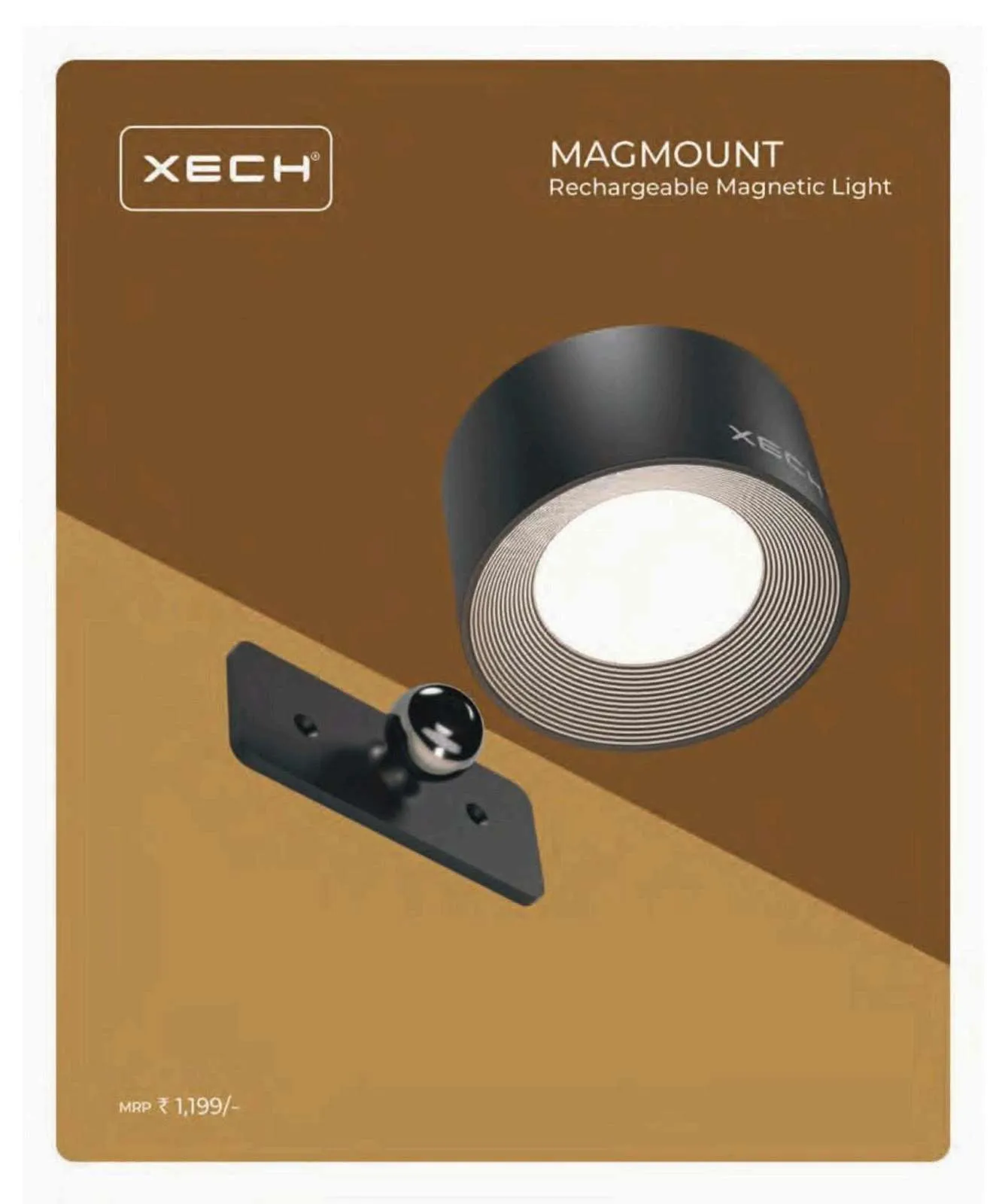 Black XECH Magmount rechargeable magnetic puck light with chrome ball mount and wall plate on a tan background