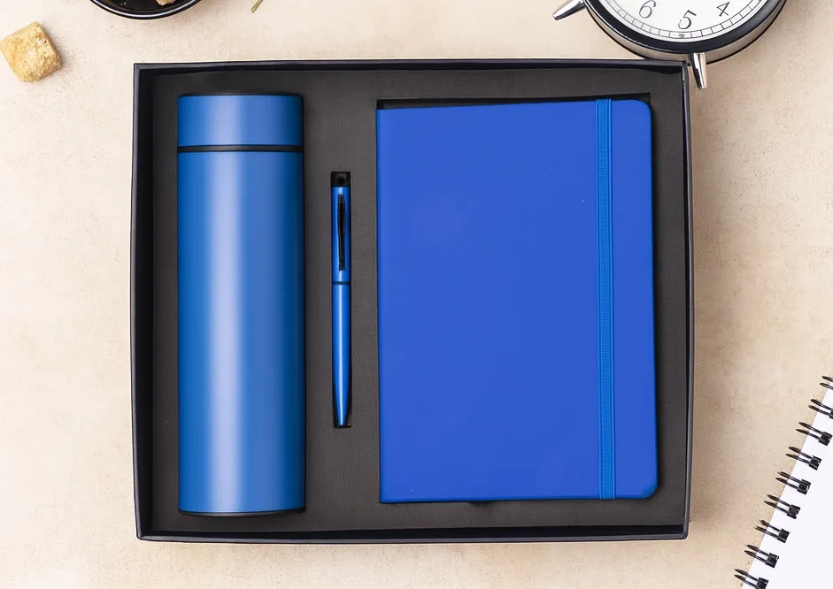 Blue Neat Nest gift set with a vacuum flask, matching pen and hardbound diary in a black foam-lined box