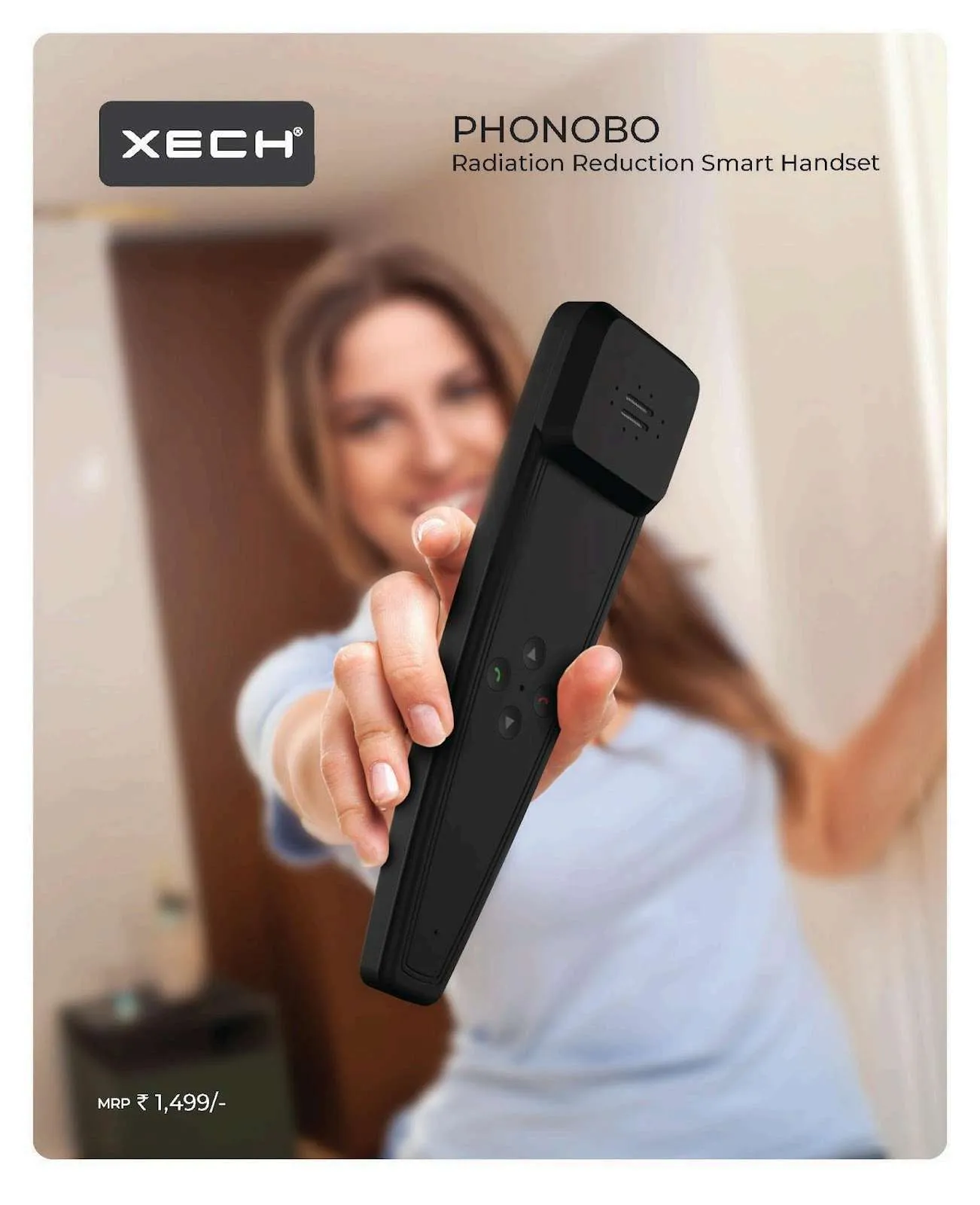 Hand holding a matte-black XECH Phonobo Bluetooth handset with call-control buttons