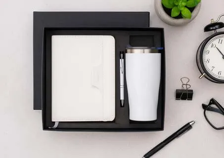 White leatherette diary, white insulated tumbler and pen in a black two-piece gift box