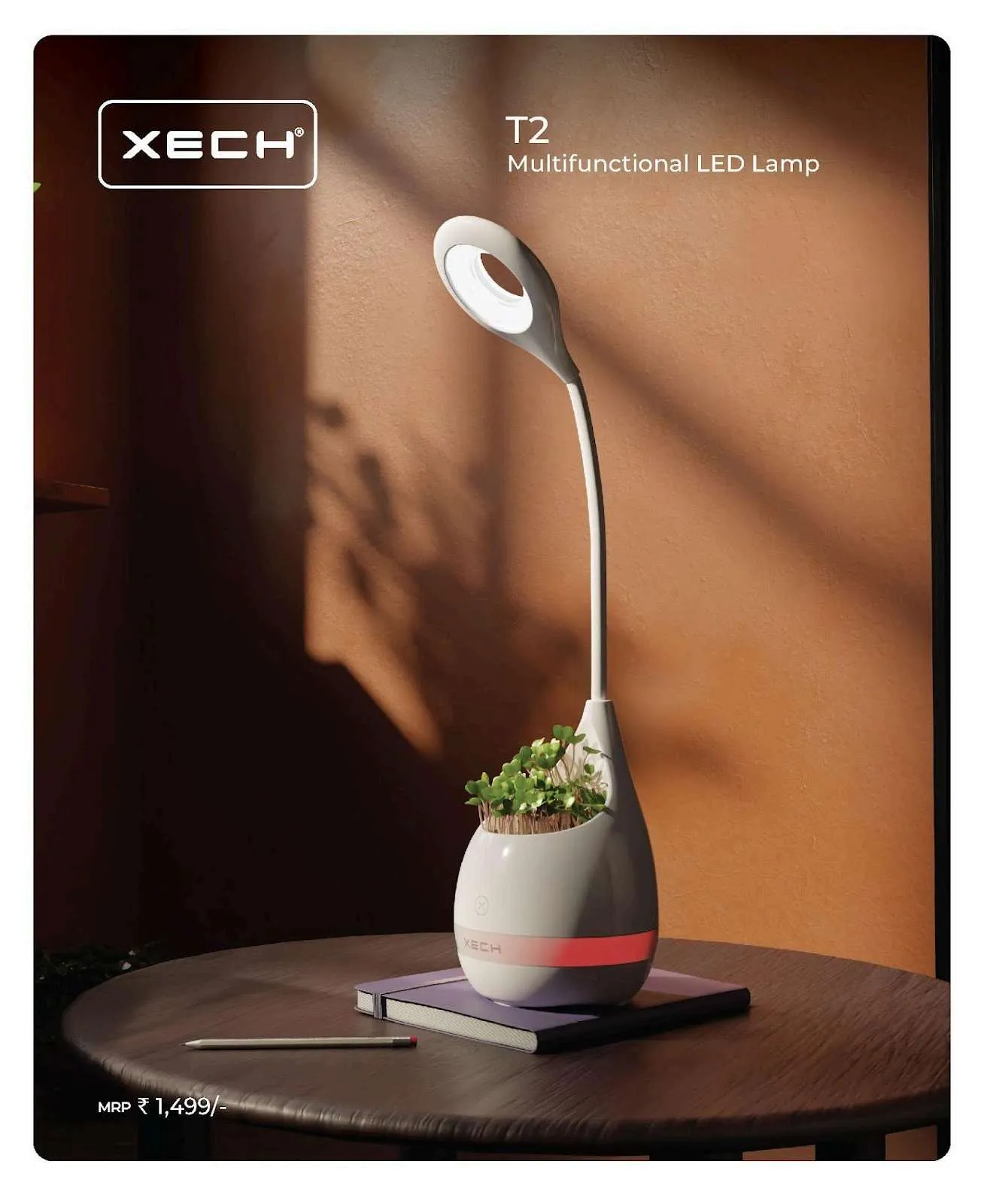 White XECH T2 vase-shaped LED desk lamp with a ring light and small planter of green sprouts on a wooden table.