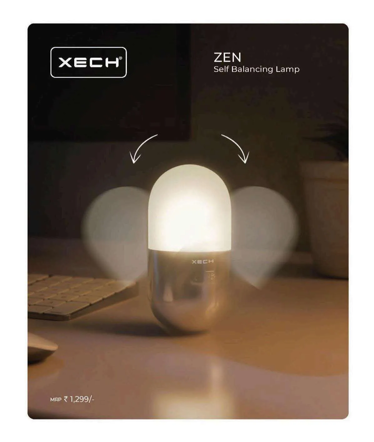 XECH ZEN capsule-shaped self-balancing lamp with warm glow and chrome base on a desk